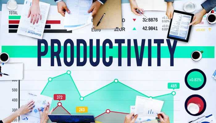 Increased productivity A desk with charts, graphs, and documents, highlighting productivity data with the word'PRODUCTIVITY' in focus, symbolizing the Pomodoro Technique's impact on work efficiency.