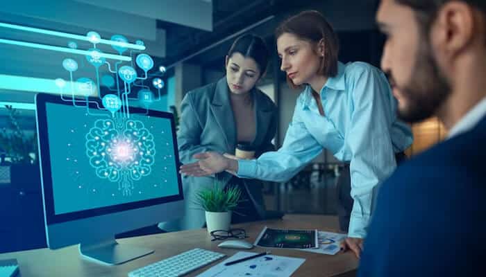 Ai A group of professionals discussing ai trends on a computer screen, showcasing collaboration and technology in the freelancing career space.