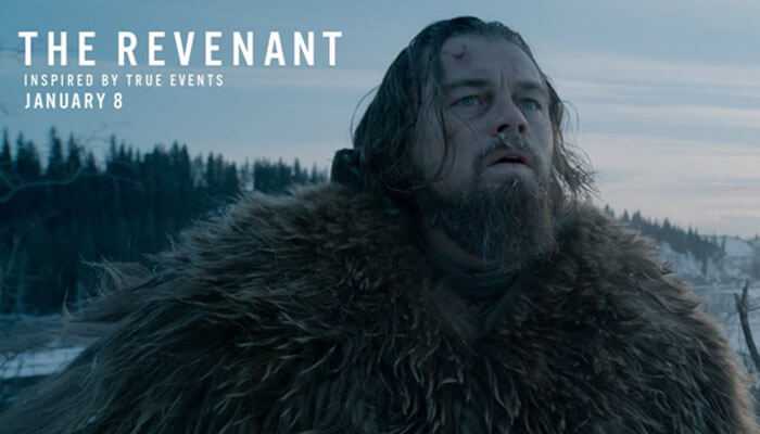 Leonardo dicaprio movies A rugged man with long, messy hair and a thick beard stands in a snowy wilderness, wrapped in a large fur coat that covers most of his body. His face looks weathered, marked with cuts and dirt, and he gazes upward with an expression of exhaustion and determination.