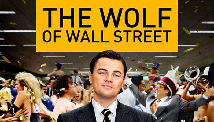 The wolf of wall street - tycoonstory | tycoonstory media Leonardo dicaprio as jordan belfort in the wolf of wall street with a chaotic party scene in the background.