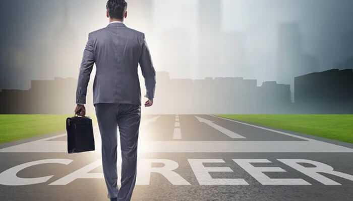 Challenges of making a career change - tycoonstory | tycoonstory media Business professional walking toward a road labeled'Career,' symbolizing the journey and challenges involved in making a career change.