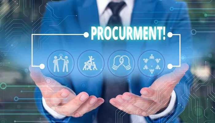 Enabling data-driven decision making - tycoonstory | tycoonstory media A businessman holding a digital display with procurement and it represents procurement and source-to-pay software.