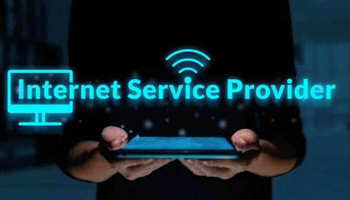 Faster and unrestricted internet speeds - tycoonstory | tycoonstory media Concept of vpn: a person holding a tablet with glowing text'Internet Service Provider,' a Wi-Fi symbol.