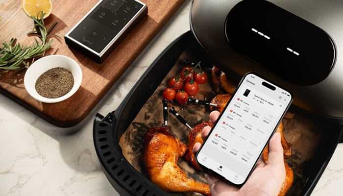 Growth of the smart home market - tycoonstory | tycoonstory media Smartphone app for real-time temperature monitoring with typhur wireless thermometer while grilling chicken and tomatoes.