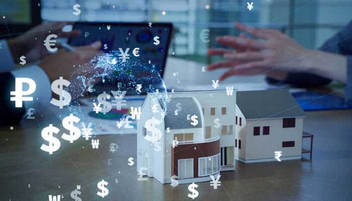 New investment scopes - tycoonstory | tycoonstory media Global currency symbols for a model house representing real-world assets in web3 and tokenized investments via blockchain.