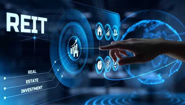 Real estate investment trusts reits - tycoonstory | tycoonstory media Digital interface displaying real estate investment trust icons, with a hand pointing out various real estate investment strategies.