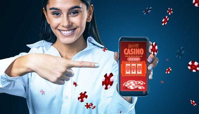 Security and privacy | tycoonstory media Smiling woman pointing at a smartphone displaying the pin up apk online casino app, with poker chips floating around her.