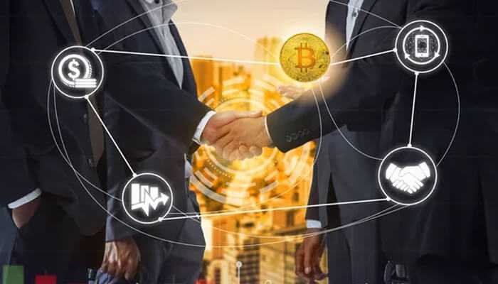 Strategic partnerships and innovations - tycoonstory | tycoonstory media Two professionals shaking hands with bitcoin icons interrelated with partnership, money, technology and analytics it represents bitcoin investment banking strategic partnership.