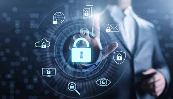 Advanced security features - tycoonstory | tycoonstory media Business professional interacting with a digital lock icon and data storage visuals, representing secure cloud archiving services.