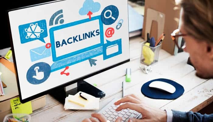 Build high-quality backlinks - tycoonstory | tycoonstory media Man working on system to build high-quality backlinks for niche market seo