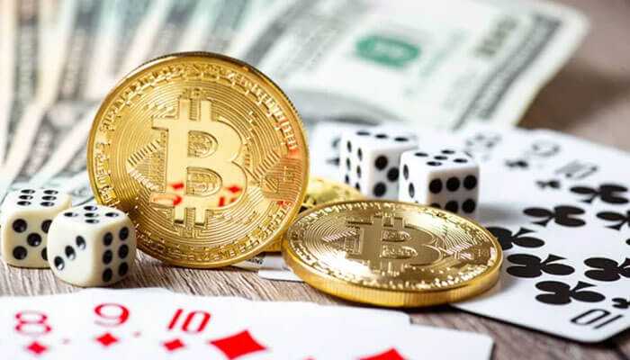Choosing the right platform - tycoonstory | tycoonstory media Bitcoin coins with playing cards, dice, and dollar bills: the use of cryptocurrency in crypto casinos and online gambling.