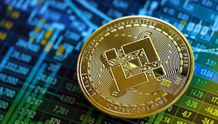 Economic model and tokenomics of bnb - tycoonstory | tycoonstory media Binance coin (bnb) displayed on a digital trading background, symbolizing cryptocurrency investment and trading on the binance exchange