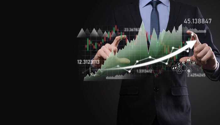 Hedge funds and market efficiency - tycoonstory | tycoonstory media Businessman analyzing financial graphs, showcasing hedge funds role in market trends