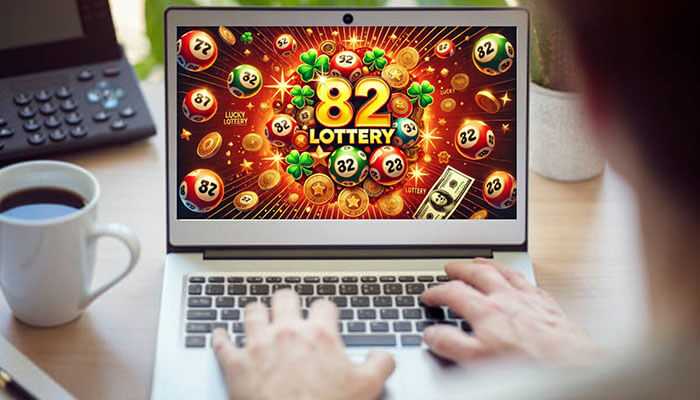 How to get started with 82 lottery - tycoonstory | tycoonstory media Person using a laptop displaying the vibrant 82 lottery interface with lottery balls, clovers, and money graphics, symbolizing online lottery gaming and luck