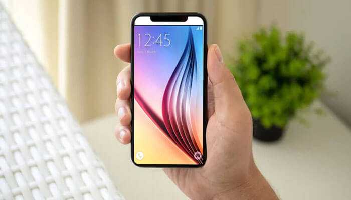 Less responsive buttons - tycoonstory | tycoonstory media Hand holding the sleek smartphone, showing how a thicker phone case can protect while keeping the phone usable.
