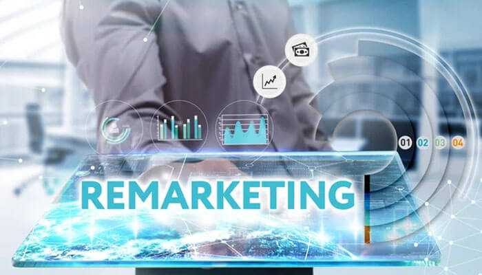 Role of agencies in remarketing - tycoonstory | tycoonstory media Business remarketing concept with a business professional interacting with a digital interface, data visualization icons appear.