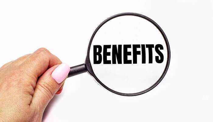 The benefits of quickbooks training - tycoonstory | tycoonstory media Magnifying glass focusing on the word'Benefits' with a context related to bookkeeping services in San Antonio.
