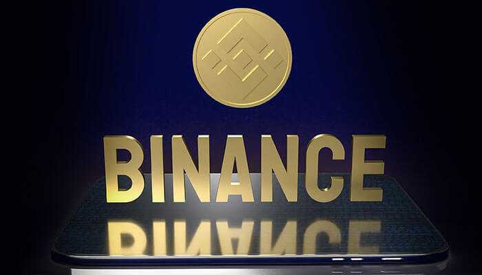 The impact of binance coin on the crypto market - tycoonstory | tycoonstory media Binance coin (bnb) logo displayed in 3d on a reflective surface, symbolizing its prominence in the cryptocurrency market and its role within the binance ecosystem