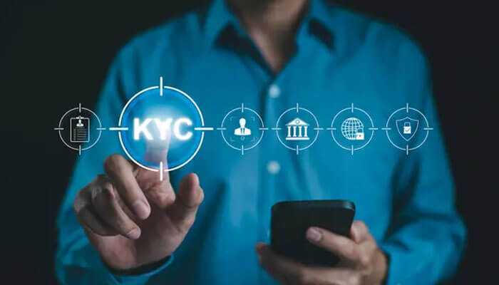 The roles of kyc compliance in banking - tycoonstory | tycoonstory media A person using a digital kyc interface, highlighting identity verification processes and why are kycs unpopular with consumers.