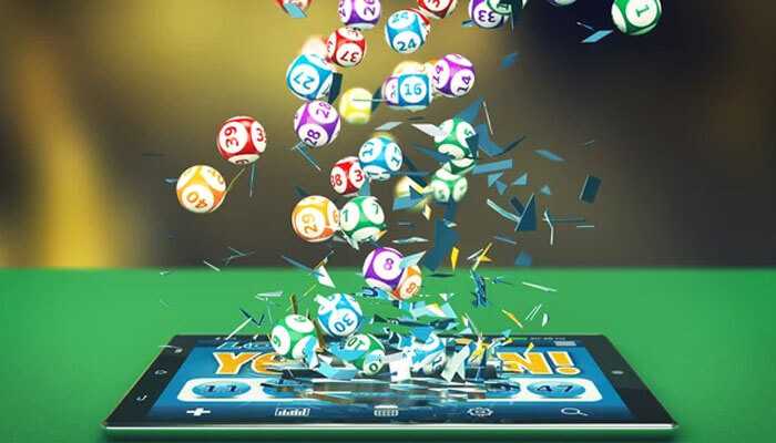 556 Lottery with lottery balls bursting out of a tablet with a You Win message