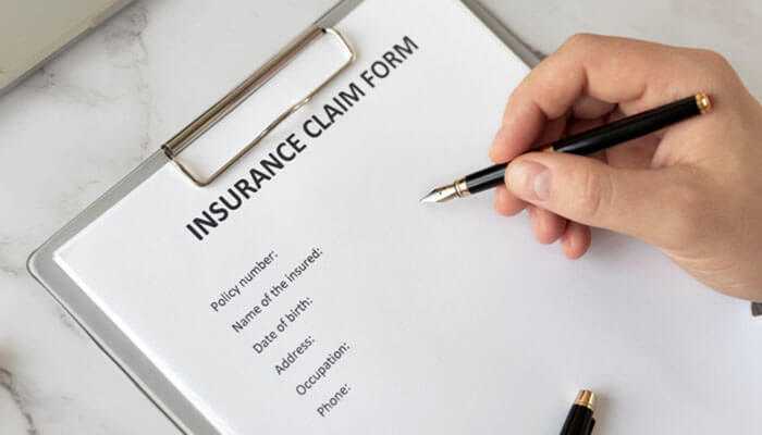 Be careful when dealing with insurance companies - tycoonstory | tycoonstory media Pedestrian accident claim insurance claim form being filled out with a pen showing fields for policy number name of the insured date of birth address occupation and phone number