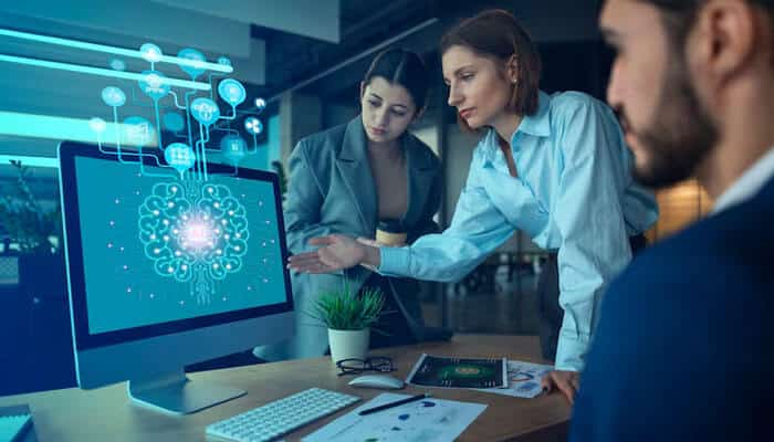 Candidate assessment - tycoonstory | tycoonstory media Team analyzing ai powered cognitive technology for recruitment innovations displayed on a computer screen, representing the future of hiring