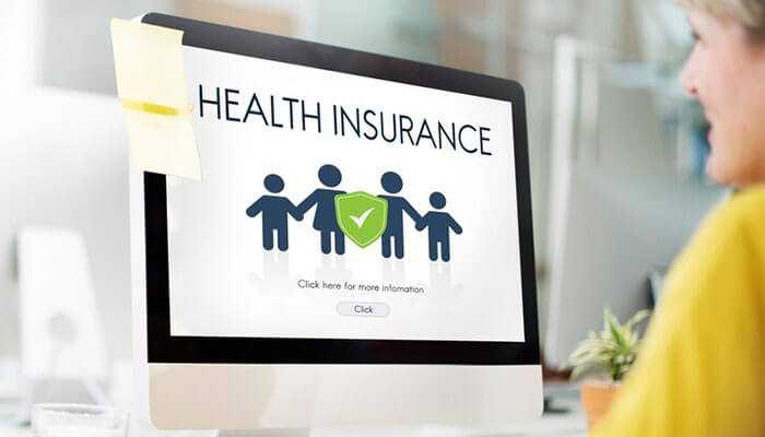 Health insurance plans Family mediclaim vs individual health insurance options: computer screen showing'Health Insurance' with a family and shield illustration, ideal for highlighting.