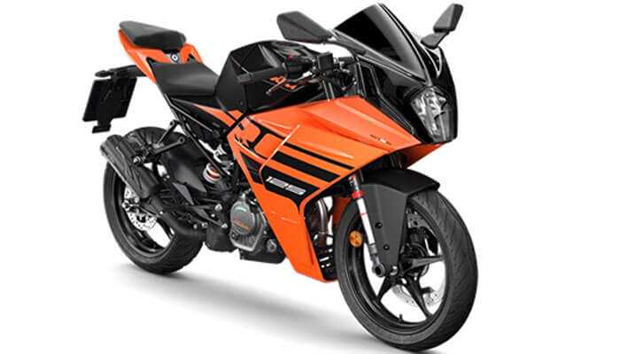 Ktm rc 125 - tycoonstory | tycoonstory media An orange and black ktm rc 125 sports bike with sharp, aerodynamic design and modern graphics.