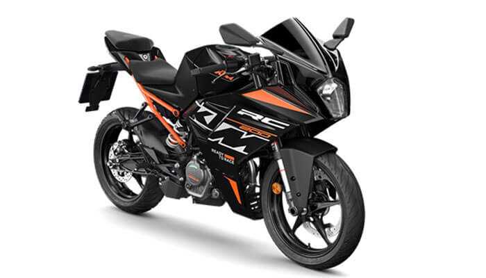 Ktm rc 200 - tycoonstory | tycoonstory media A black and orange ktm rc 200 sports bike featuring bold ktm branding and a sleek, sporty appearance.