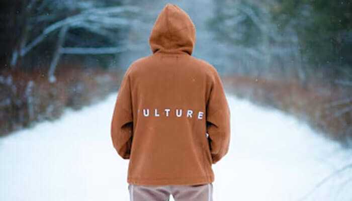Text-based designs - tycoonstory | tycoonstory media Wintet hoodie designs: a person wearing brown winter hoodie design with'Culture' printed on the back.