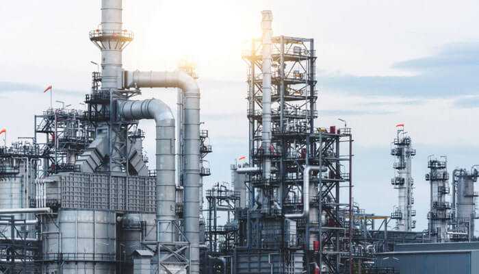 The benefits of advanced steel tubes in the energy sector - tycoonstory | tycoonstory media Oil refinery of oil and gas, note the steel pipelines to display advanced infrastructure in the u. S. Energy sector, under clear skies.