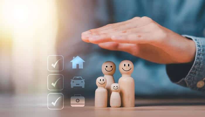 The role of insurance in managing risks - tycoonstory | tycoonstory media A hand protecting wooden family figures, symbolizing insurance coverage for home, auto, and travel. Slip and fall lawsuits involve injury claims due to unsafe property conditions.