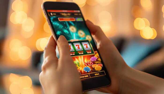 Casino | tycoonstory media A smartphone shows an andar bahar interface with a slot machine game, as held against the background of an ethereal glowing blur.