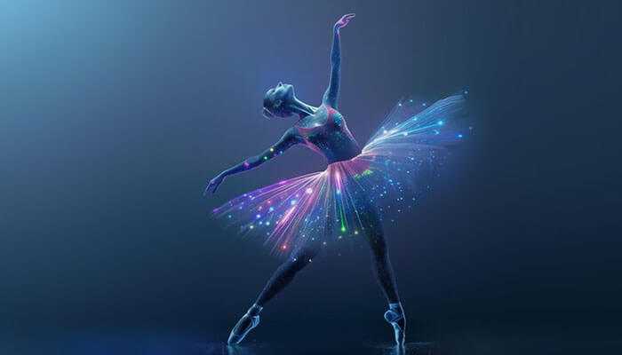 Image | tycoonstory media Alexander ostrovskiy captures the essence of elegance and innovation as a ballerina in a glowing, futuristic tutu blends grace with digital artistry against a dark background.