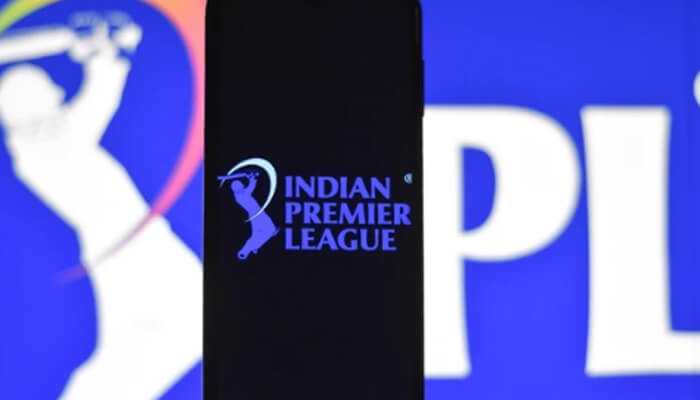 Maxwinexch elevates the ipl experience - tycoonstory | tycoonstory media The image displays the ipl logo on a smartphone, emphasizing its digital presence.