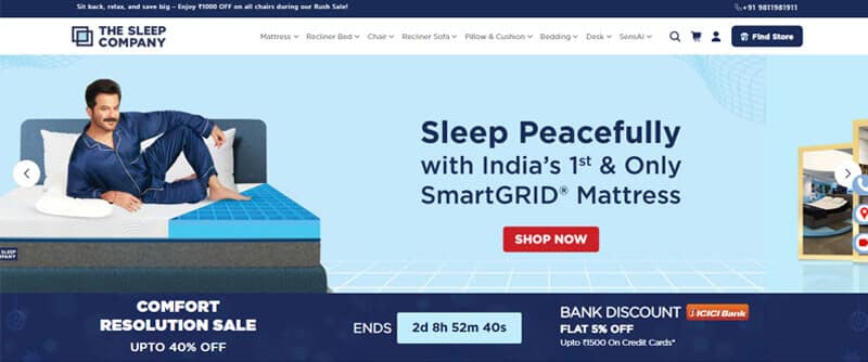 Smart luxe royale mattress by the sleep company - tycoonstory | tycoonstory media The sleep company banner promoting indias 1st smartgrid® mattress with a man lounging on a bed, featuring a comfort resolution sale offering up to 40% off and a bank discount of 5%