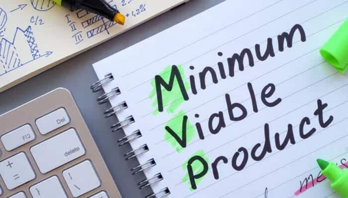 Streamlining mvp development - tycoonstory | tycoonstory media Notebook with'Minimum Viable Product' written on it, representing product development and technical skill development.