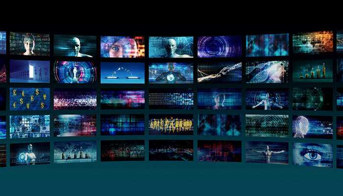 Tv advertising - tycoonstory | tycoonstory media Digital media wall displaying futuristic visuals and data analytics concepts, representing advanced media measurement technology and cross-platform audience tracking