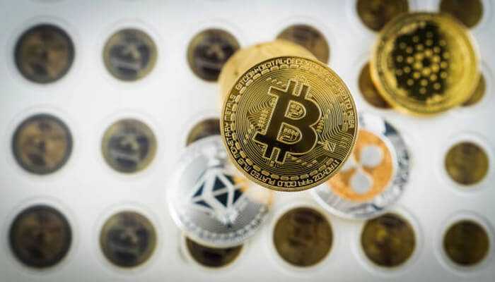 Enhanced portfolio diversification | tycoonstory media Various cryptocurrency coins, including bitcoin, highlighting the benefits of bitcoin trading in the digital currency market,