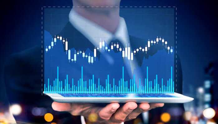 Master of macroeconomic moves - tycoonstory | tycoonstory media A businessman holding a tablet displaying a financial stock market chart, symbolizing market trends, trading strategies, and financial expertise—representing a market titan.
