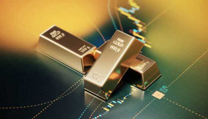 Pros and cons of using gold ira custodians - tycoonstory | tycoonstory media Gold bars placed on a financial chart, representing investment security and the role of a gold ira custodian in managing precious metal retirement accounts.