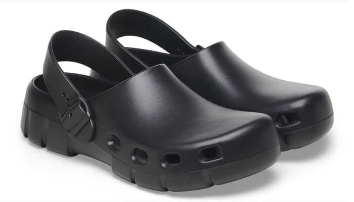 All-terrain clog | tycoonstory media Modern clogs in sleek black with a sturdy design and adjustable strap, perfect for all-day wear and practical use.