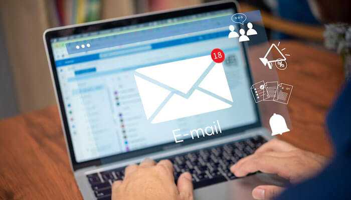 Email marketing - tycoonstory | tycoonstory media Email marketing strategy for tech startup business – hands typing on laptop with email icons representing campaign outreach.