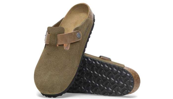 Laid-back essential | tycoonstory media Modern clogs in olive green with a comfortable fit and rugged sole, perfect for casual and outdoor wear.
