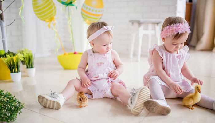 Outfits patpat provides for every occasion | tycoonstory media Adorable baby girls in pink patpat clothes playing indoors with ducklings.