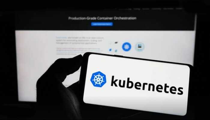 Kubernetes logo with text highlighting its role in managing and deploying container orchestration and upgrades.