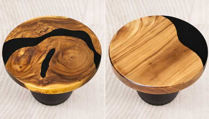 6 | tycoonstory media A round and square wood table top featuring a black resin river running through it, with a modern black base for a sophisticated look.