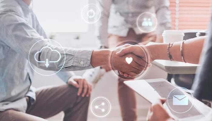 Customer engagement | tycoonstory media Social media marketing agency professionals shaking hands with digital icons floating around, representing customer engagement and communication.