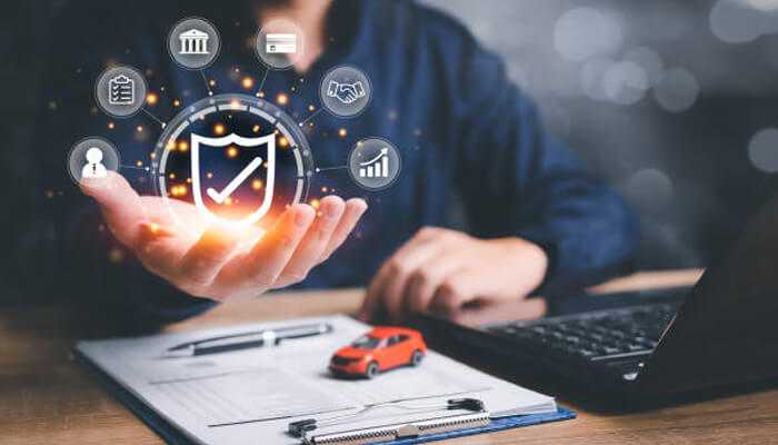 Data privacy and security | tycoonstory media Person holding digital icons representing data security and insurance, illustrating the future of auto insurance and data privacy.
