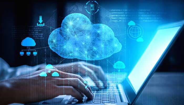 Financial benefits of sage 50 cloud hosting | tycoonstory media Person typing on laptop with digital cloud icons, illustrating secure and accessible sage 50 cloud hosting for financial management